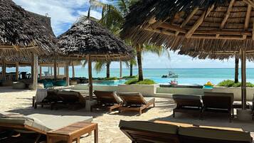 Outdoor pool, pool umbrellas, pool loungers