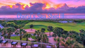 A golf course with a view of the sea and a sunset. - AMELIA ISLAND PLANTATION VILLA 2/2 IN A GATED COMMUNITY JUST OFF BEACH LOCATION (Fernandina Beach)
