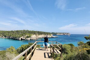 Beach nearby, white sand, beach shuttle, beach volleyball