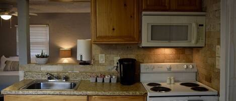 Fridge, microwave, oven, cookware/dishes/utensils