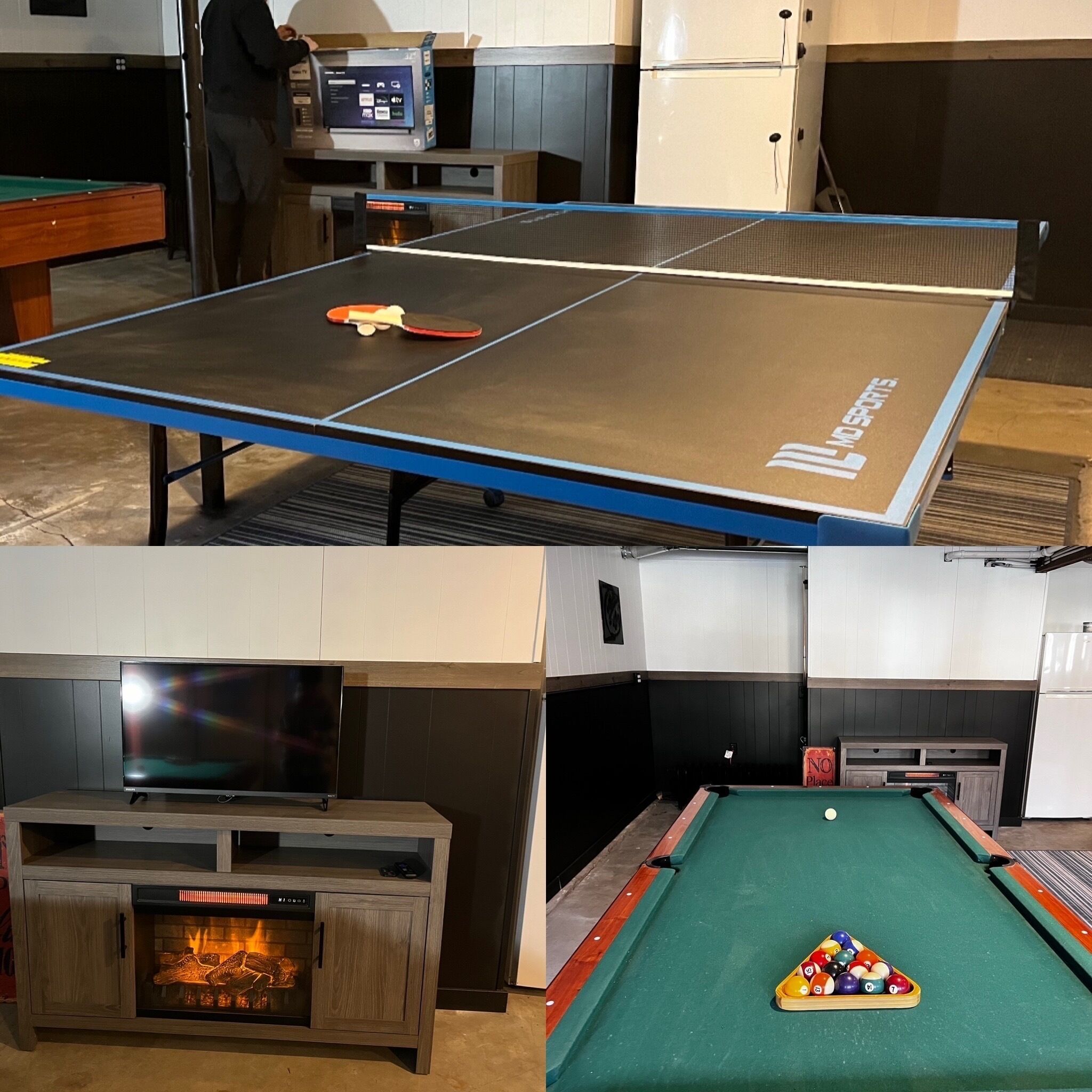 Een tafeltennistafel, een pool tafel en een open haard in een kamer met kasten en een televisie.