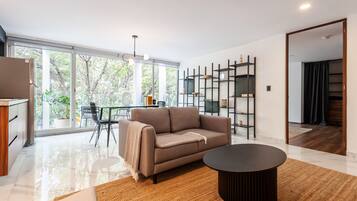 Apartment, Balcony (401) | Living area | 46-inch Smart TV with cable channels
