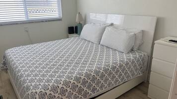 1 bedroom, desk, iron/ironing board, travel crib