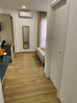 Comfort-værelse til 4 personer | Dundyner, senge med madrasser af memory foam, minibar