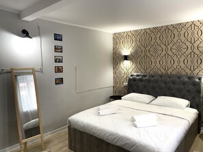 1 chambre, fer et planche à repasser, Wi-Fi, literie fournie