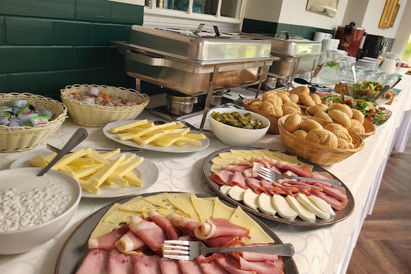 Free daily local cuisine breakfast