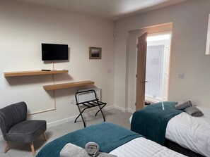 2 bedrooms, travel crib, WiFi, bed sheets