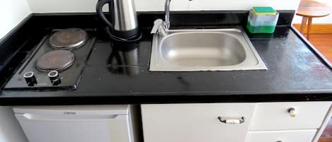 Superior Studio | Private kitchen | Mini-fridge, stovetop, electric kettle, high chair