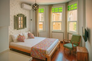 Design-Studio | Hochwertige Bettwaren, kostenlose Minibar, individuell dekoriert