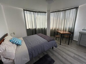 1 habitación y ropa de cama