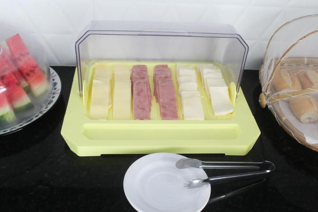 A food storage container with various food items.