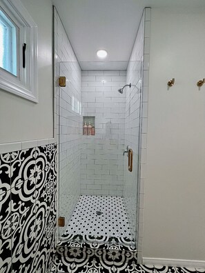 Shower, eco-friendly toiletries, hair dryer, towels