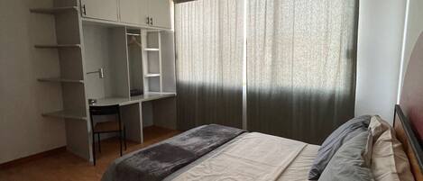 1 habitación y ropa de cama