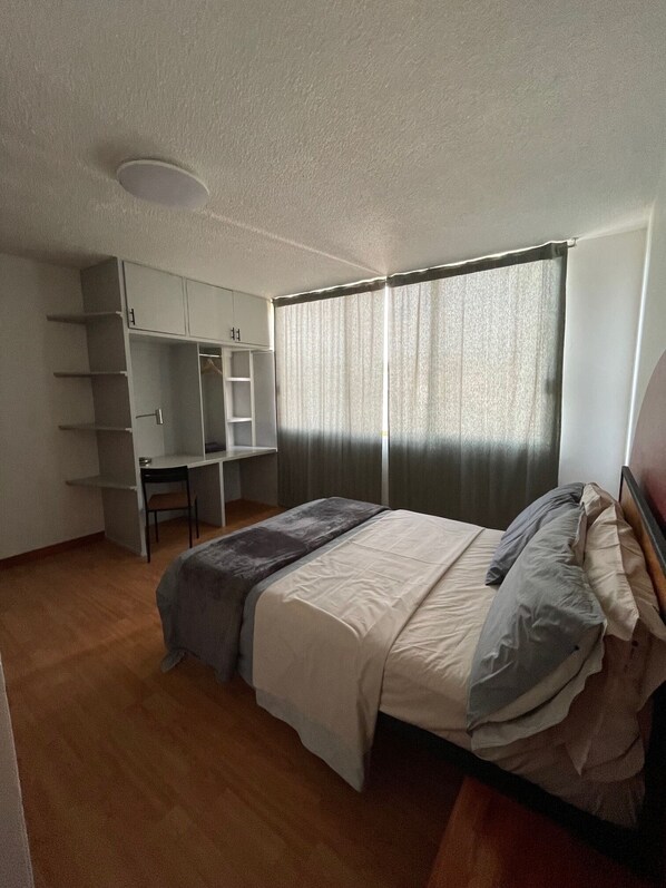 1 habitación y ropa de cama 