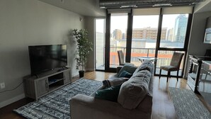 Living area - One bed downtown laundry wifi across from the Jets arena (Winnipeg)
