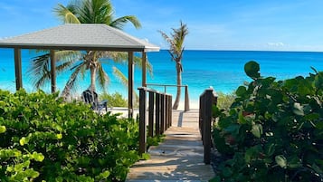 On the beach, sun loungers, beach towels
