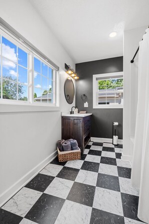 Shower, towels, soap, toilet paper