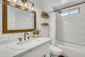 Hair dryer, towels, soap, shampoo