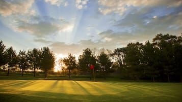 Enjoy a round of golf on our meticulously maintained course, surrounded by lush greenery and scenic views.