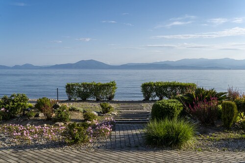 Traditional villa in a complex beside the sea.