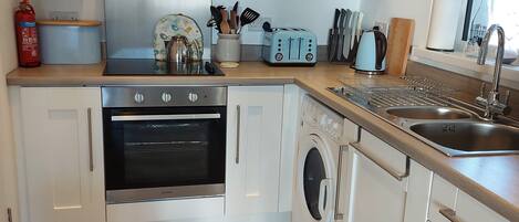 Fridge, oven, electric kettle, toaster