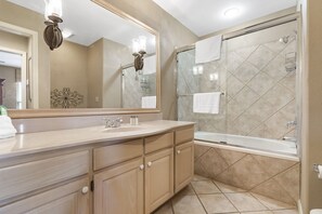 Shower, jetted tub, hair dryer, towels