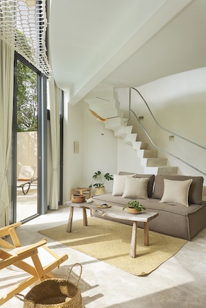 Signature Apartment | Living area | Flat-screen TV