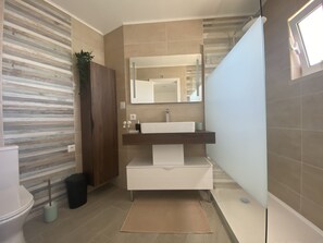 Hair dryer, towels, soap, shampoo
