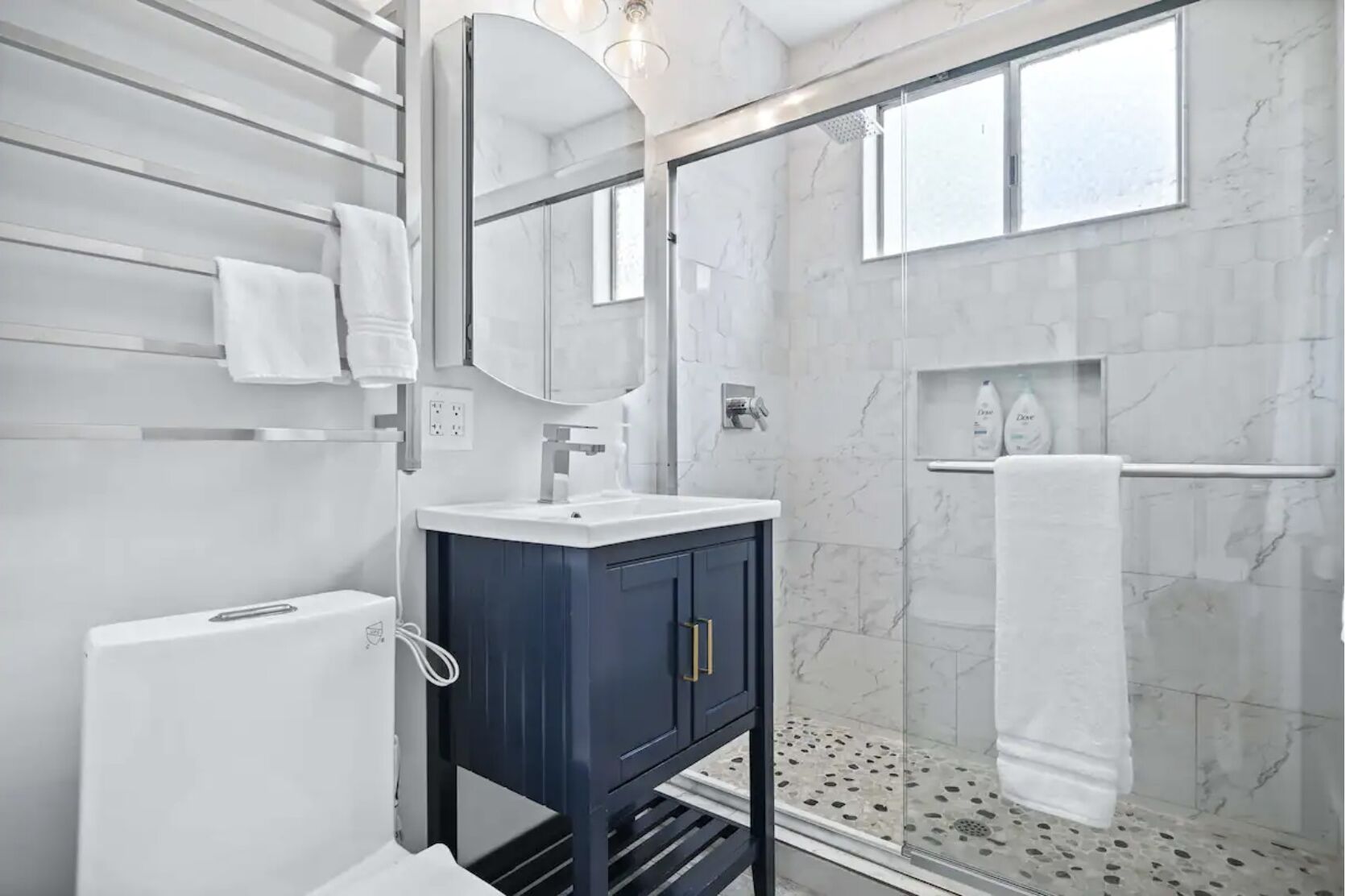Shower, hair dryer, towels, soap