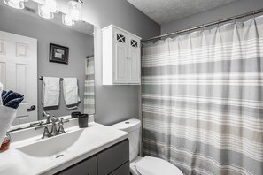 Hair dryer, towels, soap, shampoo