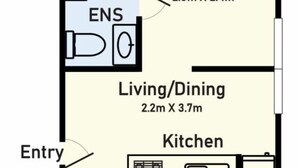 Plano de planta que muestra un dormitorio de 2,8m x 2,4m, un área de estar/comedor de 2,2m x 3,7m, una cocina y una entrada.