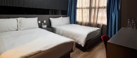 Family Room | In-room safe, desk, blackout drapes, iron/ironing board