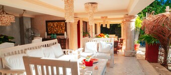 Luxurious villa with private beach access and spacious gardens