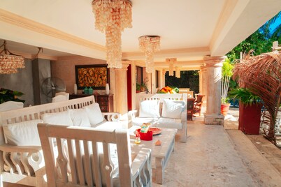 Luxurious villa with private beach access and spacious gardens