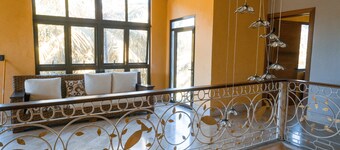 Luxurious villa with private beach access and spacious gardens