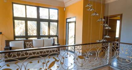 Luxurious villa with private beach access and spacious gardens