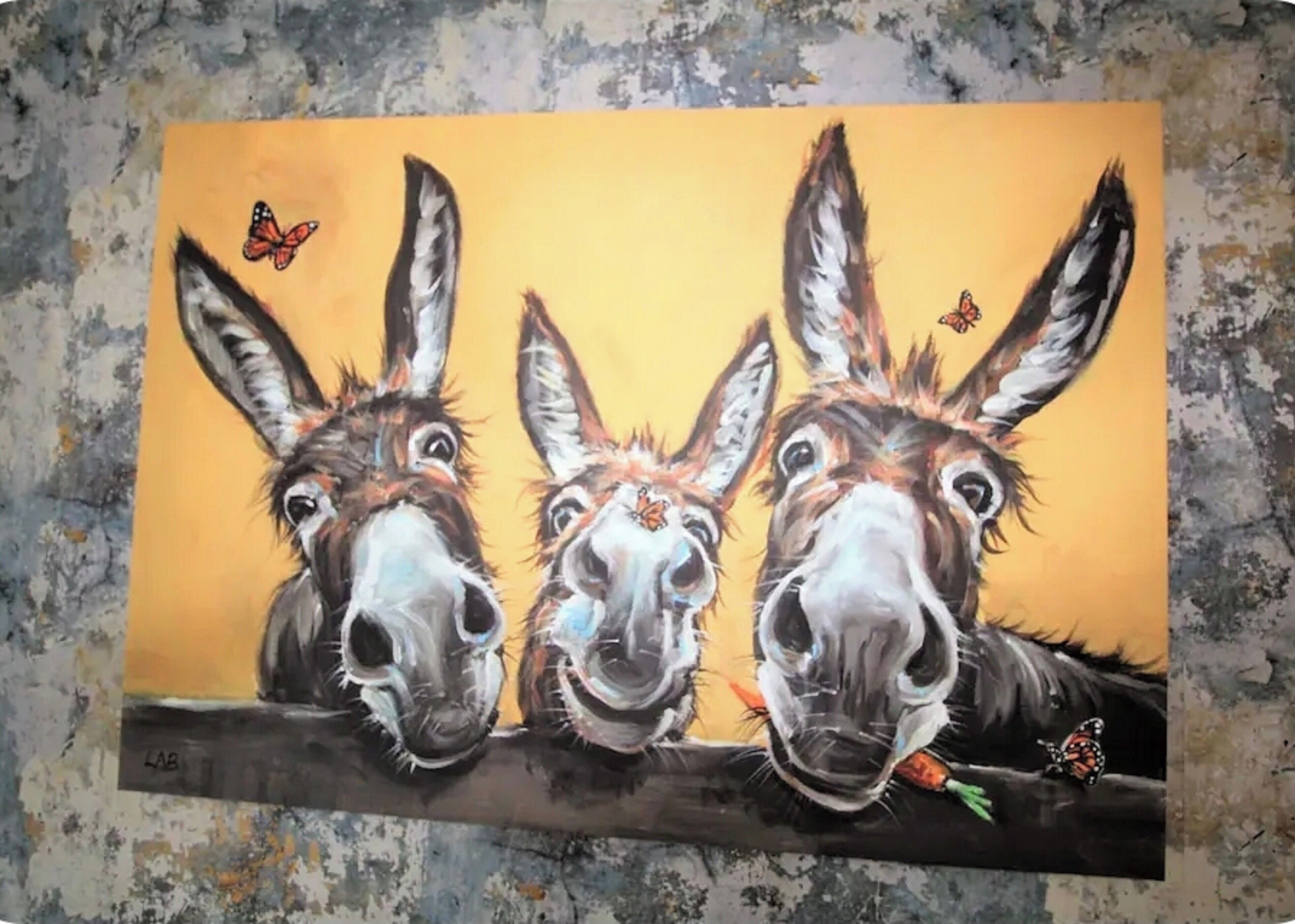 A painting of three donkeys on a branch with butterflies.