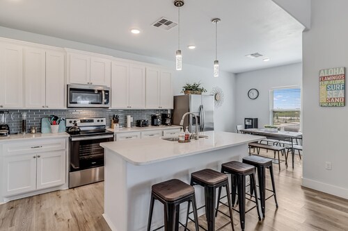 Dog-friendly ocean view home with an enclosed yard, washer/dryer, & central AC