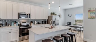 Dog-friendly ocean view home with an enclosed yard, washer/dryer, & central AC