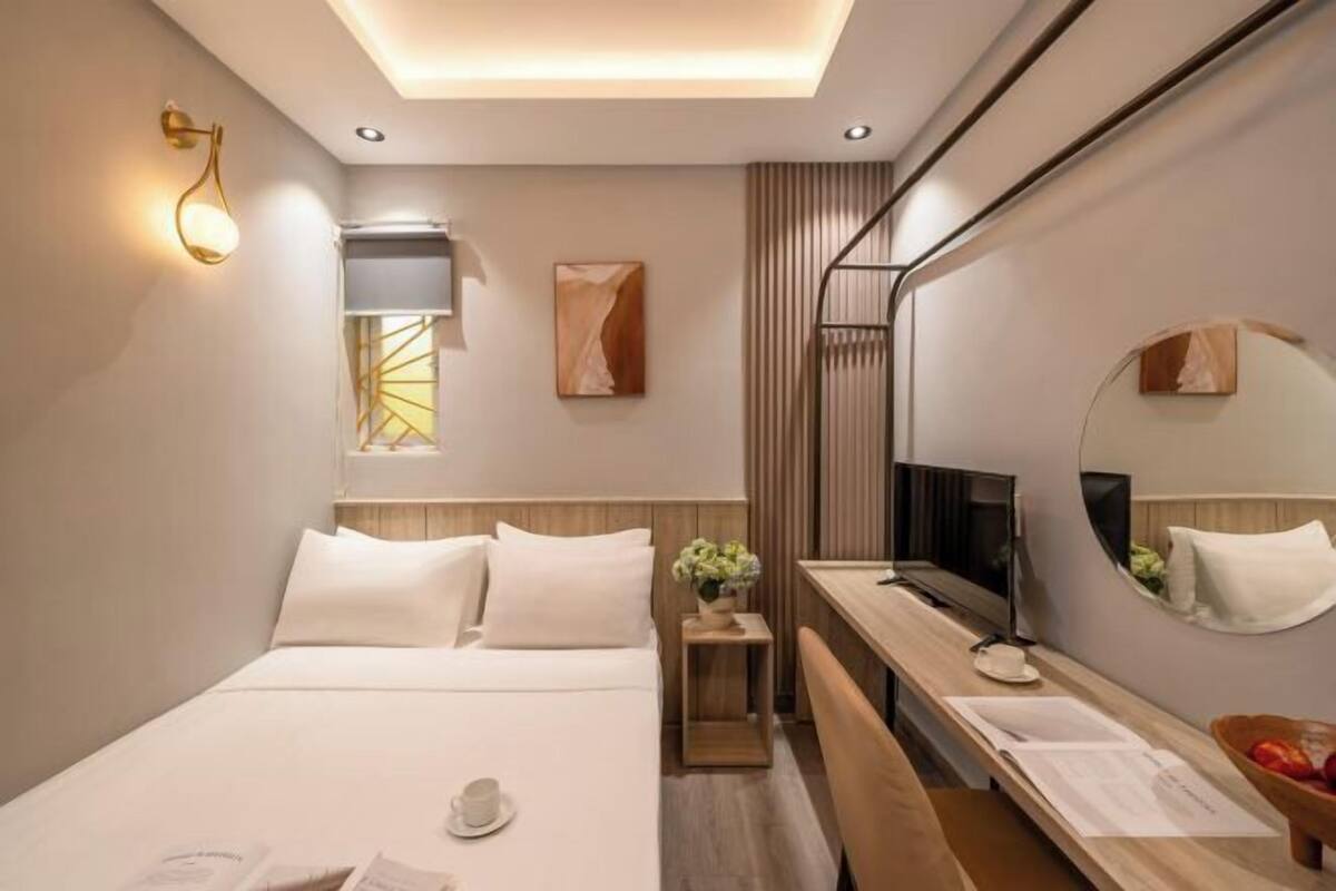 Een minibar, een bureau, een laptopwerkplek, gratis wifi