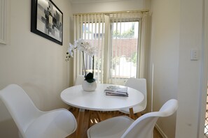Comfort Apartment, 1 Queen Bed with Sofa bed, Non Smoking, Courtyard View | In-room dining - Box Hill Compact Home Small family WiFi (Box Hill)