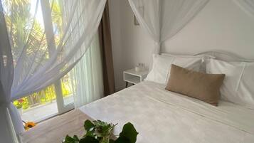 Deluxe Room, 1 Queen Bed, Lanai | Frette Italian sheets, premium bedding, individually decorated