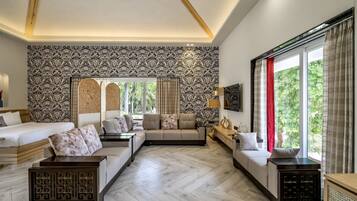 Superior Suite, 1 King Bed | Living area | 42-inch LCD TV with cable channels, TV