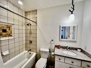 Hair dryer, towels, soap, shampoo