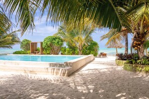 Outdoor pool, open 8:00 AM to 7:00 PM, pool umbrellas, pool loungers