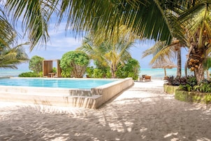 Outdoor pool, open 8:00 AM to 7:00 PM, pool umbrellas, pool loungers