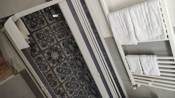 Shower, free toiletries, hair dryer, towels