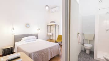 Habitación individual | Escritorio, sistema de insonorización, wifi gratis y ropa de cama