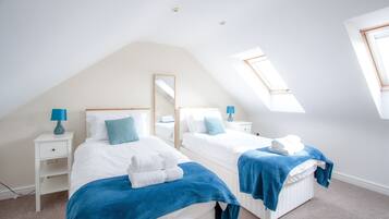 4 bedrooms, iron/ironing board, travel cot, WiFi