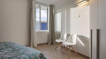 Departamento empresarial | 1 habitación, tabla de planchar con plancha, cunas y wifi gratis
